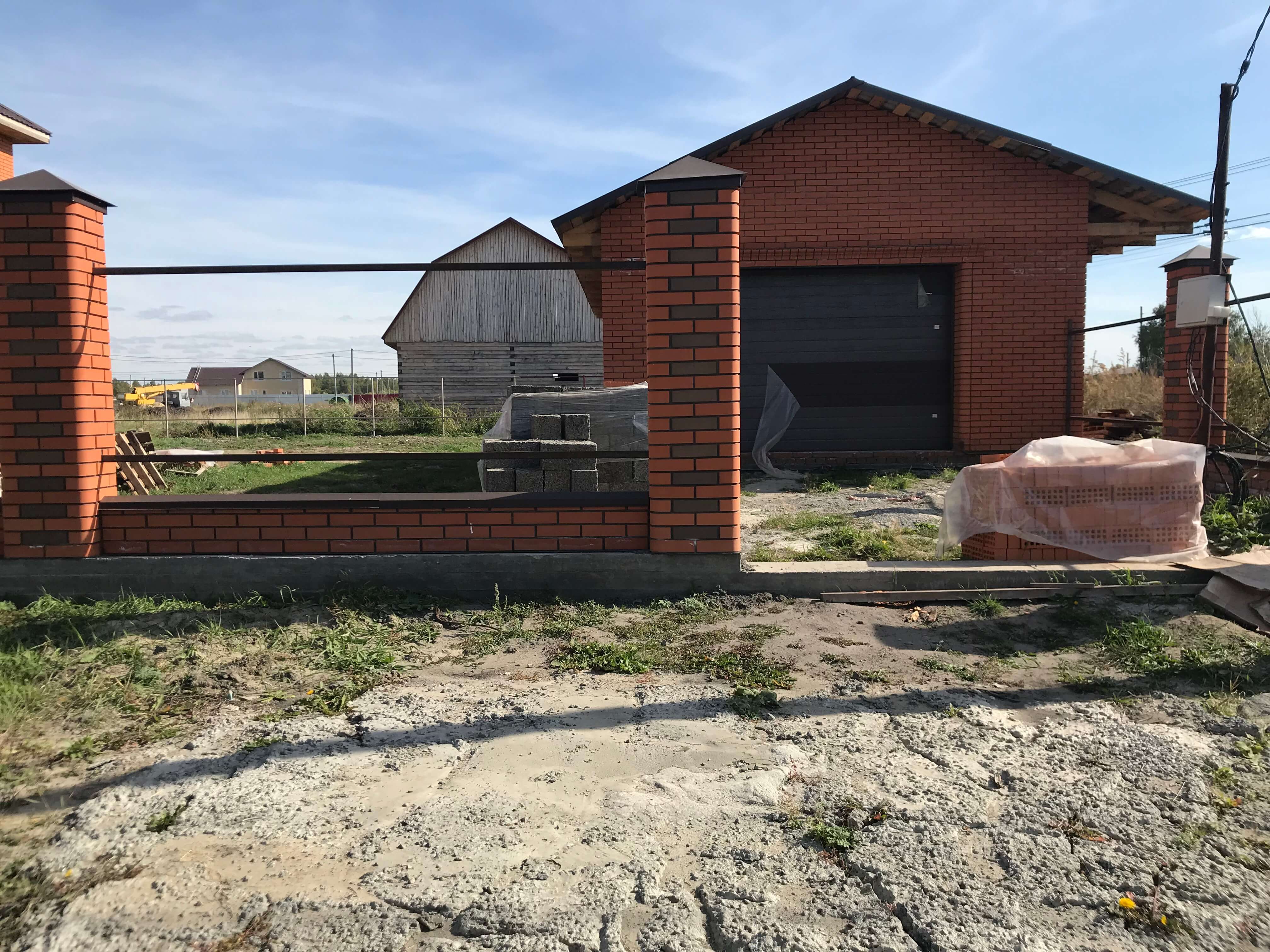 Дом из пенобетонных блоков с облицовкой керамическим кирпичом